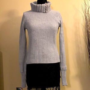 Grey turtleneck sweater with button detail